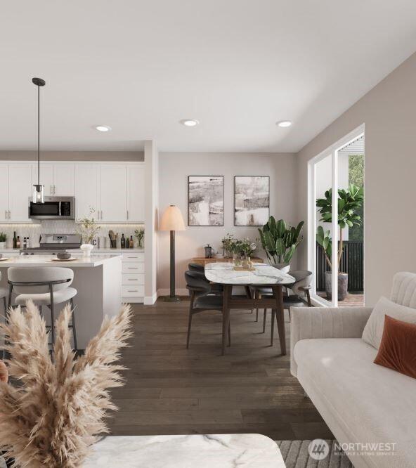 dining area featuring baseboards, dark wood-style flooring, and recessed lighting