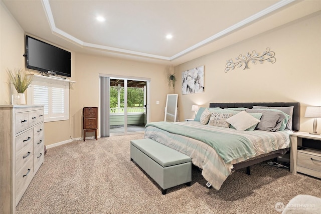 bedroom featuring recessed lighting, carpet flooring, baseboards, access to exterior, and a tray ceiling