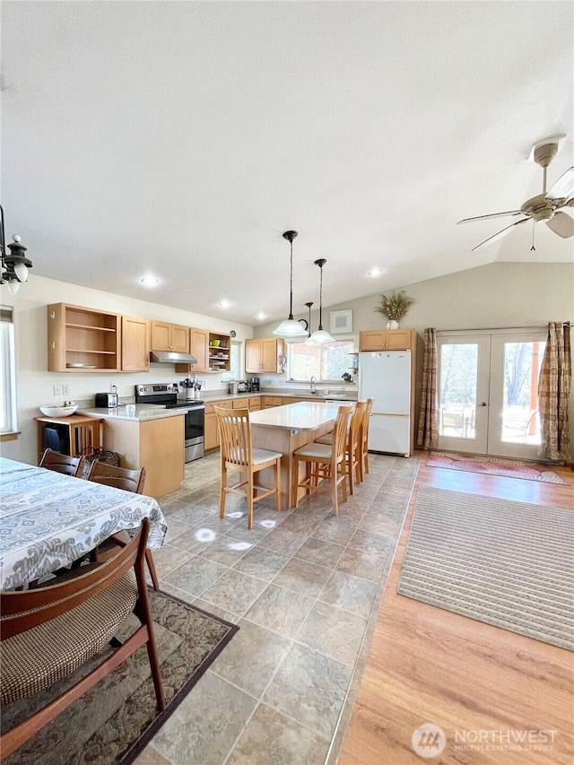 dining area featuring lofted ceiling, french doors, ceiling fan, and recessed lighting