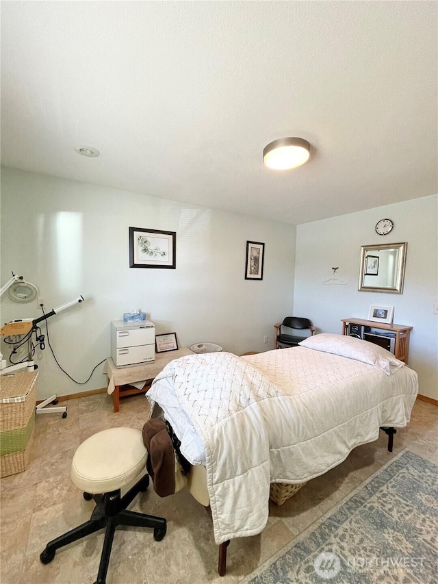 bedroom with baseboards