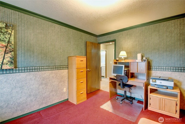 office space with a textured ceiling, crown molding, carpet, and wallpapered walls