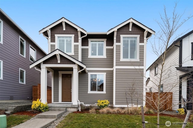 view of front of home featuring a front lawn