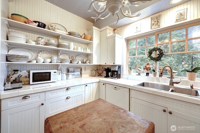 34800 J Pl, Ocean Park, WA 98640 - kitchen with white appliances, a sink, white cabinetry, light countertops, and open shelves