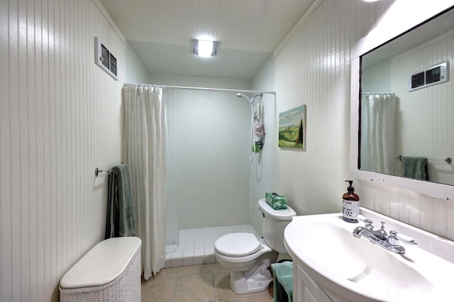 34800 J Pl, Ocean Park, WA 98640 - full bathroom with toilet, tile patterned flooring, visible vents, and a shower with shower curtain
