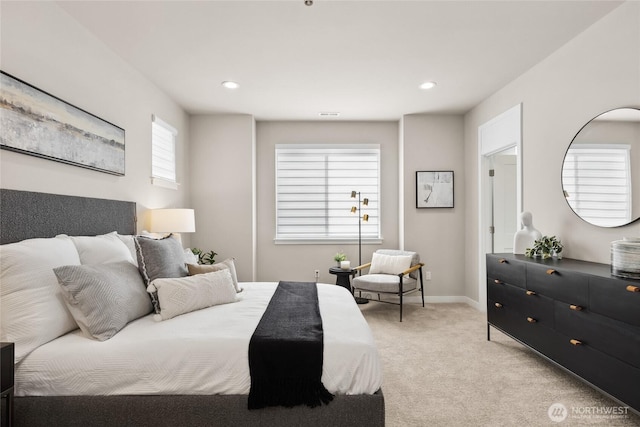 bedroom with light carpet, recessed lighting, and baseboards