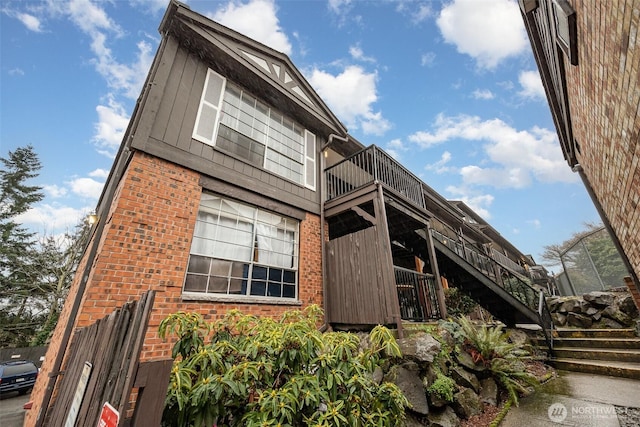 view of property featuring stairs