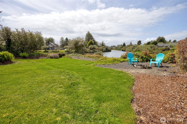 view of yard with a water view