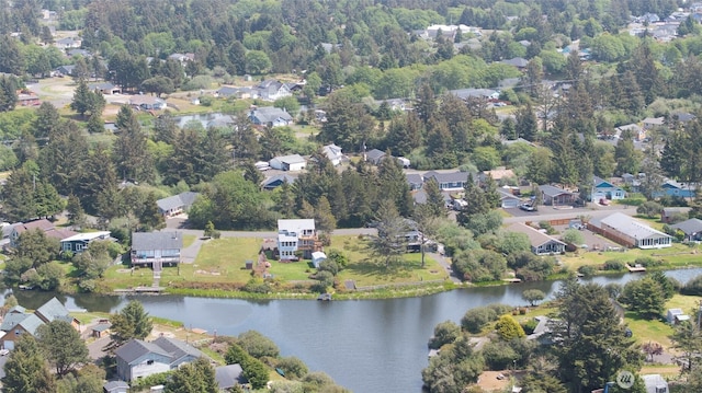 bird's eye view with a water view and a residential view