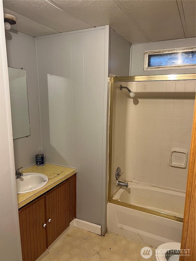 bathroom featuring shower / bath combination and vanity