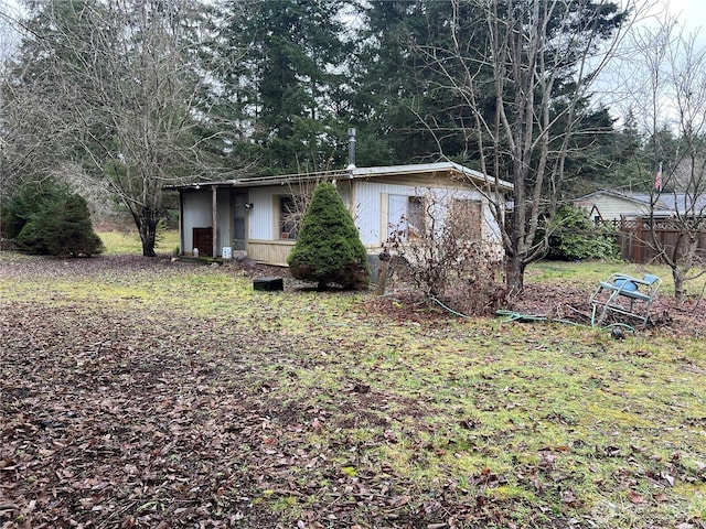 view of front of house with fence