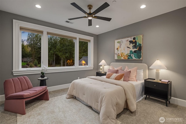 bedroom featuring carpet floors, recessed lighting, visible vents, and baseboards