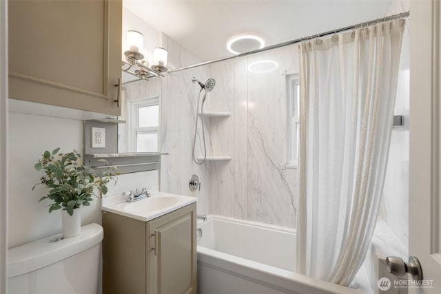 bathroom featuring shower / bath combination with curtain, vanity, and toilet