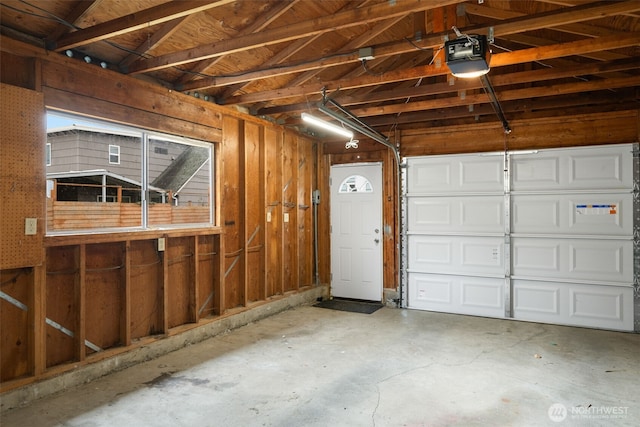 garage featuring a garage door opener