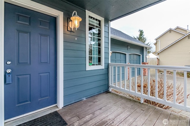 entrance to property with covered porch