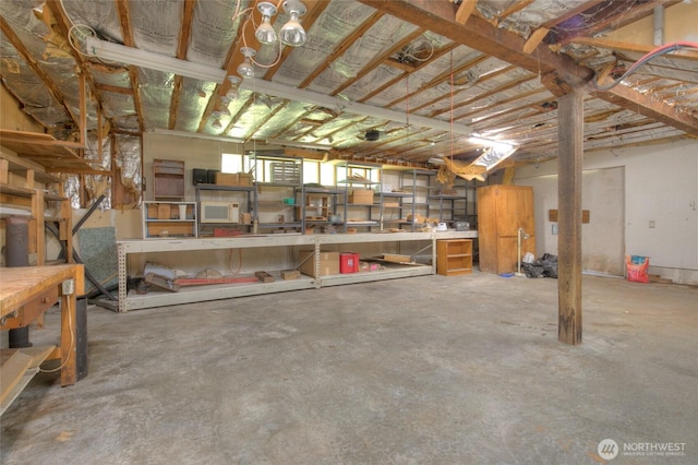 basement with a workshop area