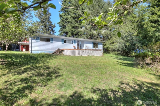 view of front of house with a front lawn