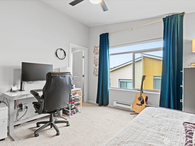 carpeted office space featuring a ceiling fan and baseboard heating