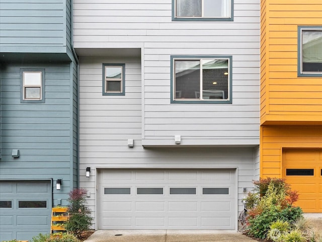 view of property exterior featuring a garage