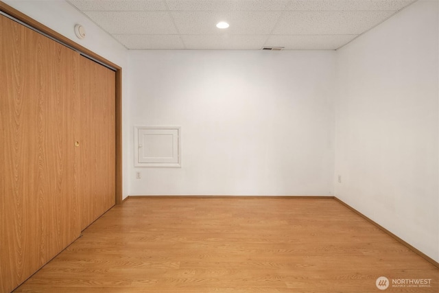 3802 Carpenter St, Mount Vernon, WA 98274 - unfurnished bedroom with a paneled ceiling, a closet, and light wood finished floors