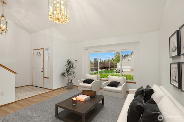 3802 Carpenter St, Mount Vernon, WA 98274 - living room featuring a chandelier, wood finished floors, and high vaulted ceiling