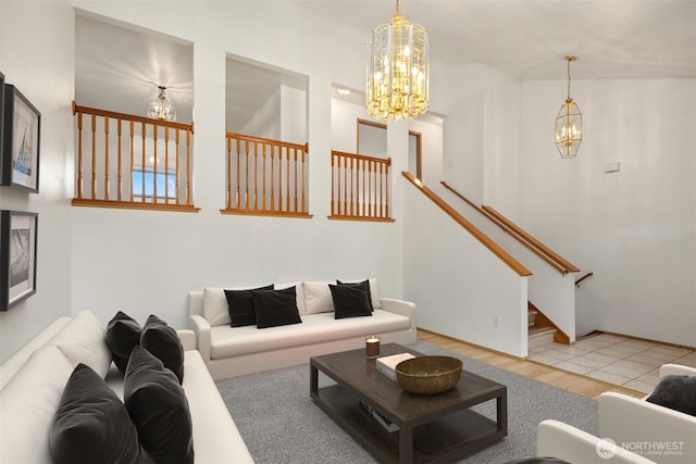 3802 Carpenter St, Mount Vernon, WA 98274 - living room featuring a chandelier, wood finished floors, and stairs