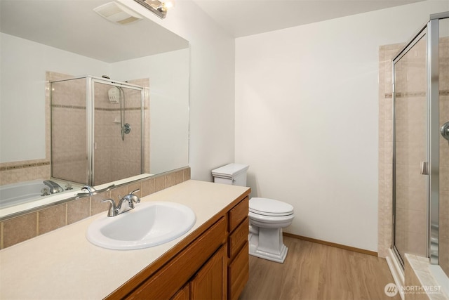 3802 Carpenter St, Mount Vernon, WA 98274 - bathroom with a stall shower, vanity, and wood finished floors