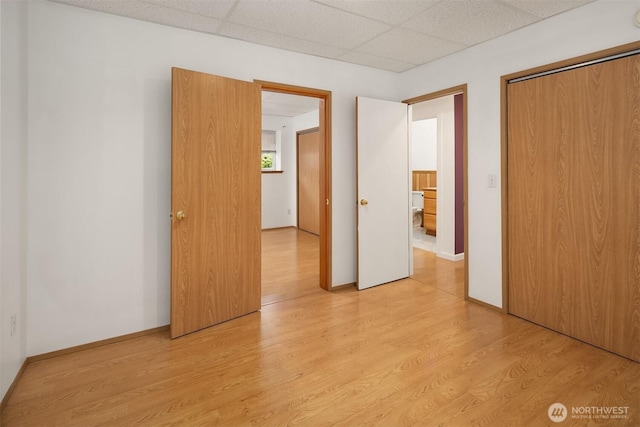 3802 Carpenter St, Mount Vernon, WA 98274 - unfurnished bedroom with light wood-type flooring, a drop ceiling, and a closet