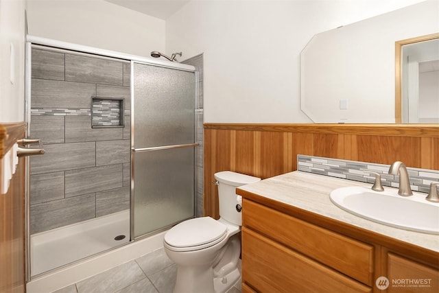 3802 Carpenter St, Mount Vernon, WA 98274 - full bathroom with vanity, a shower stall, a wainscoted wall, and tile patterned flooring