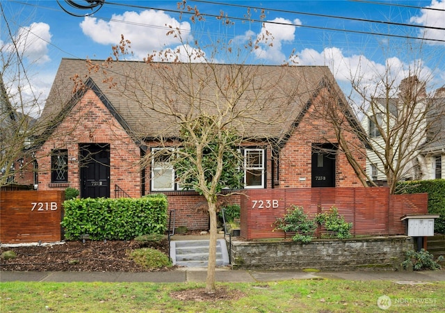 view of front of property featuring brick siding