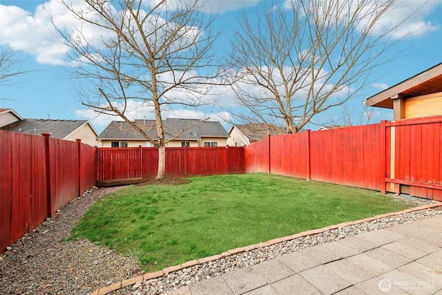 view of yard featuring a fenced backyard