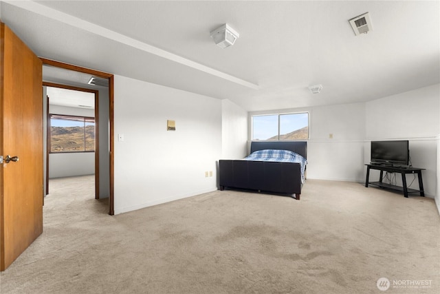 bedroom featuring visible vents, baseboards, and carpet flooring