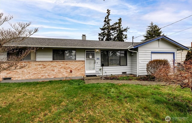 ranch-style house with brick siding, a chimney, an attached garage, a front yard, and crawl space