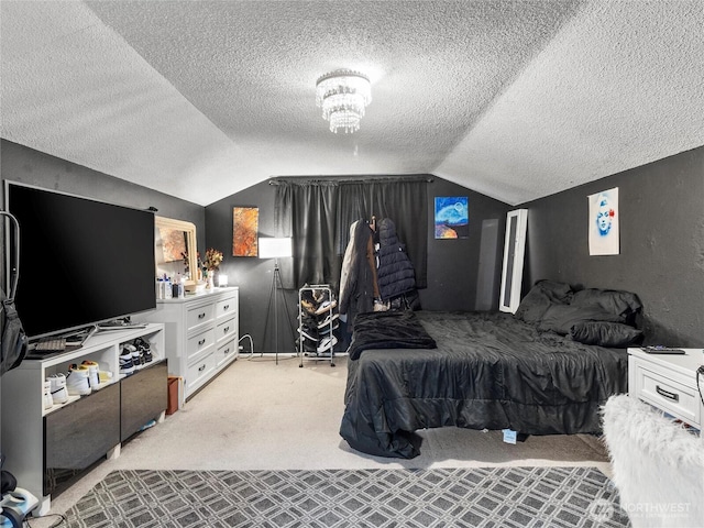 bedroom with lofted ceiling, a textured ceiling, light carpet, and a chandelier