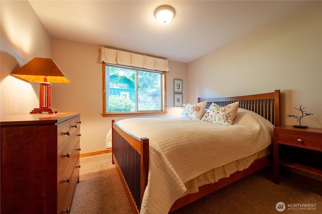 bedroom featuring light colored carpet