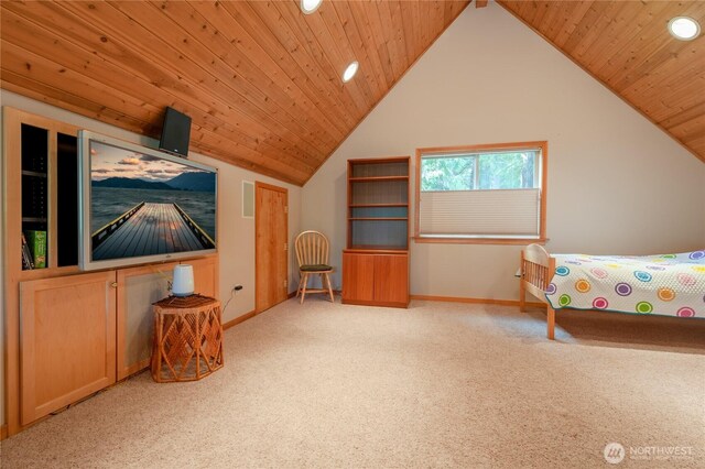 carpeted bedroom featuring lofted ceiling, wooden ceiling, and baseboards