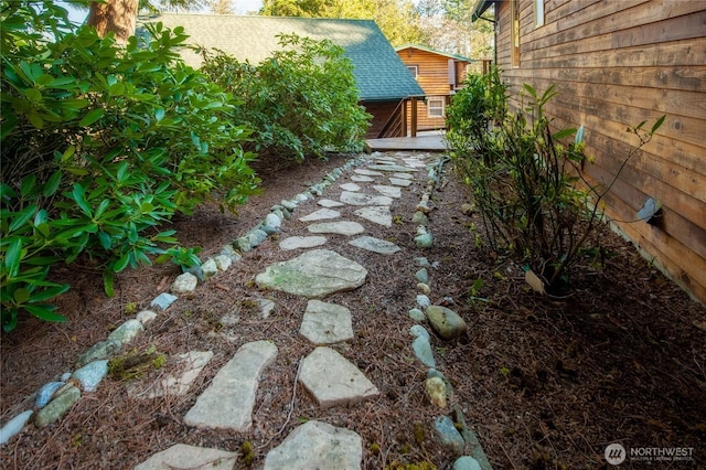 view of yard featuring a wooden deck