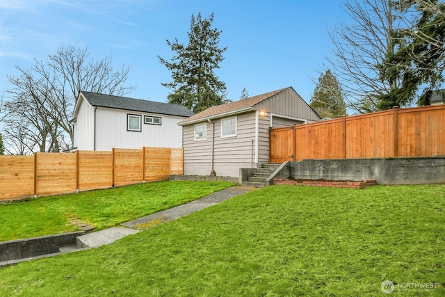 exterior space with a fenced backyard