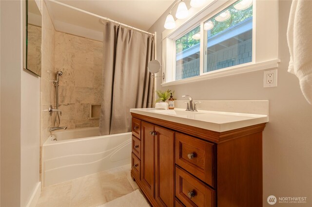 bathroom with shower / bath combo and vanity