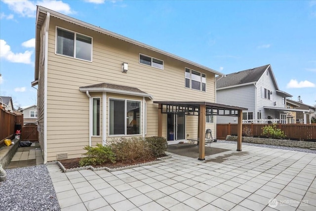 back of house with a patio area, a pergola, and a fenced backyard