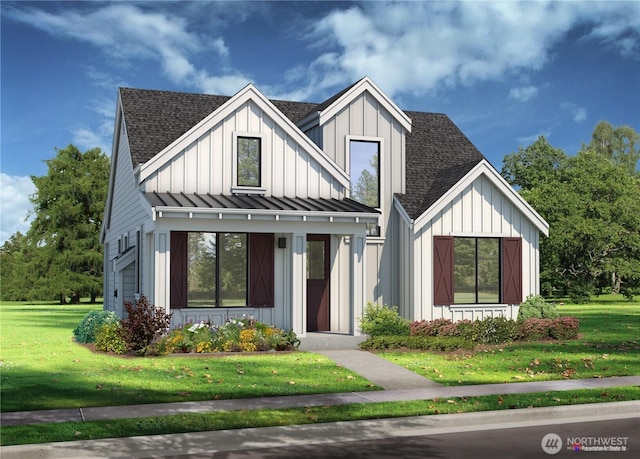 modern farmhouse style home featuring board and batten siding, a shingled roof, a front yard, metal roof, and a standing seam roof