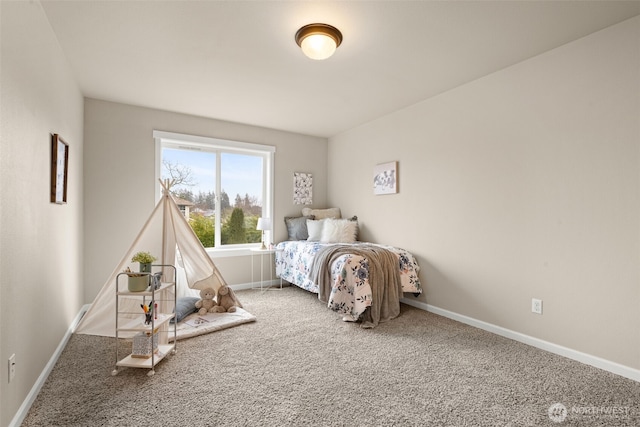 unfurnished bedroom featuring carpet and baseboards