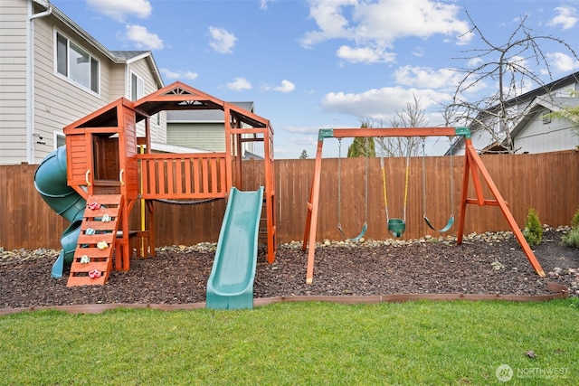 view of playground with a fenced backyard and a yard