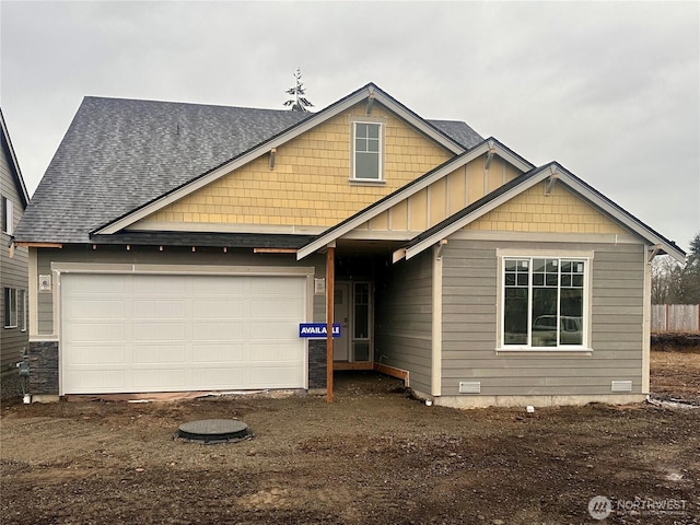 view of front facade featuring crawl space, board and batten siding, roof with shingles, and driveway