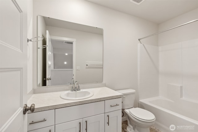 bathroom with visible vents, vanity, toilet, and shower / bathtub combination