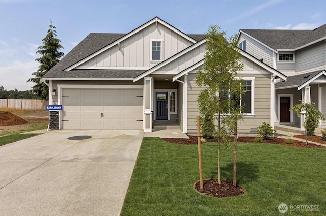 view of front of house featuring roof with shingles, board and batten siding, a garage, driveway, and a front lawn