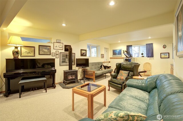 16 Koala Ln, Pacific Beach, WA 98571 - living room featuring a wood stove, carpet, and recessed lighting