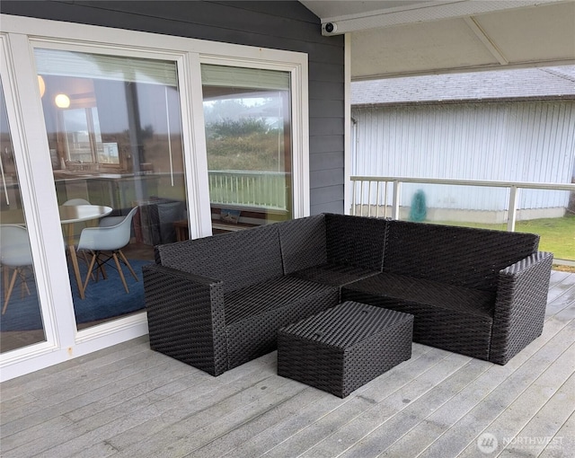 deck with an outdoor hangout area