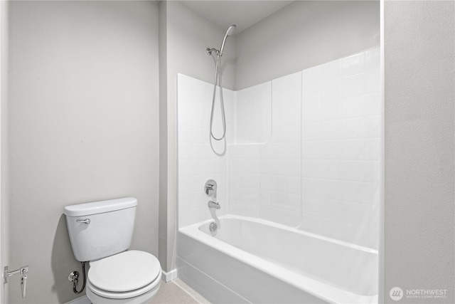 full bathroom with toilet, bathtub / shower combination, and baseboards