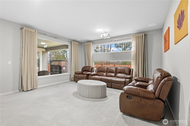 living room with carpet floors and baseboards