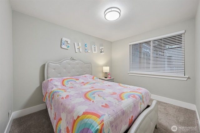 bedroom featuring baseboards and carpet flooring